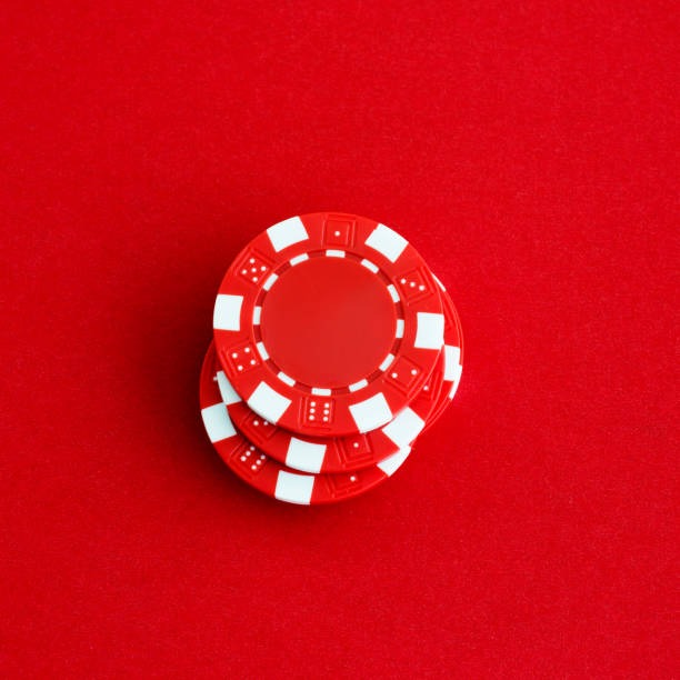 Live Sic Bo table with dealer rolling three dice in a cage, multiple camera angles visible